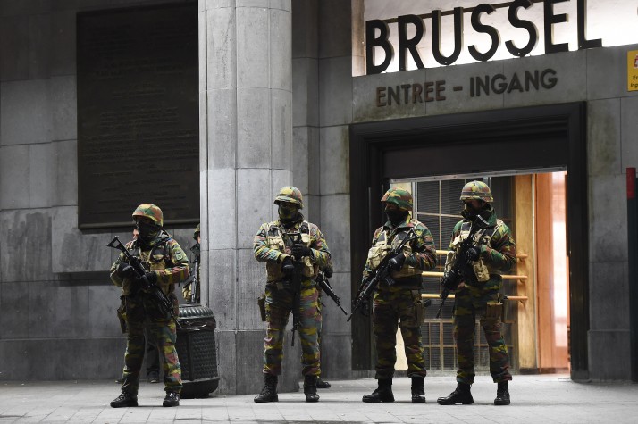 Soldiers stand guard in front of the central train station on November 22, 2015 in Brussels, as the Belgian capital remained on the highest security alert level over fears of a Paris-style attack.     AFP PHOTO / Emmanuel Dunand        (Photo credit should read EMMANUEL DUNAND/AFP/Getty Images)
